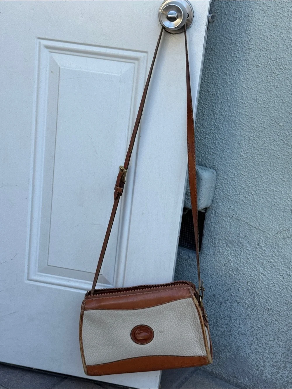 Dooney & Bourke Tan and Cream Leather Crossbody Messenger